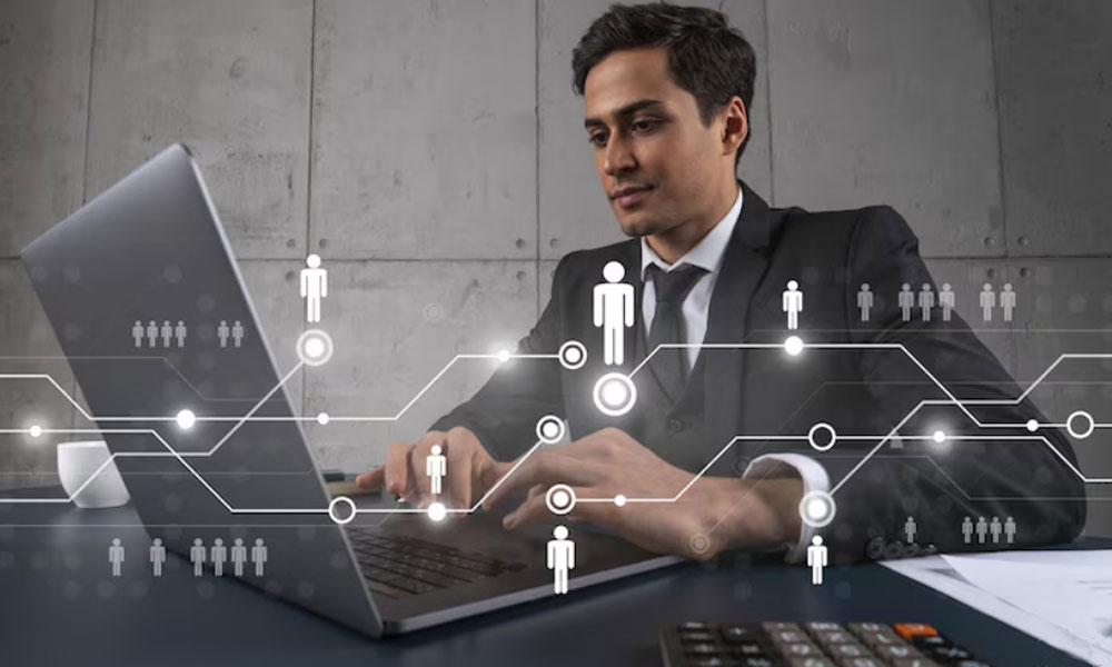 Business professional using Employee Hiring Software on a laptop with digital icons representing recruitment and candidate selection processes.