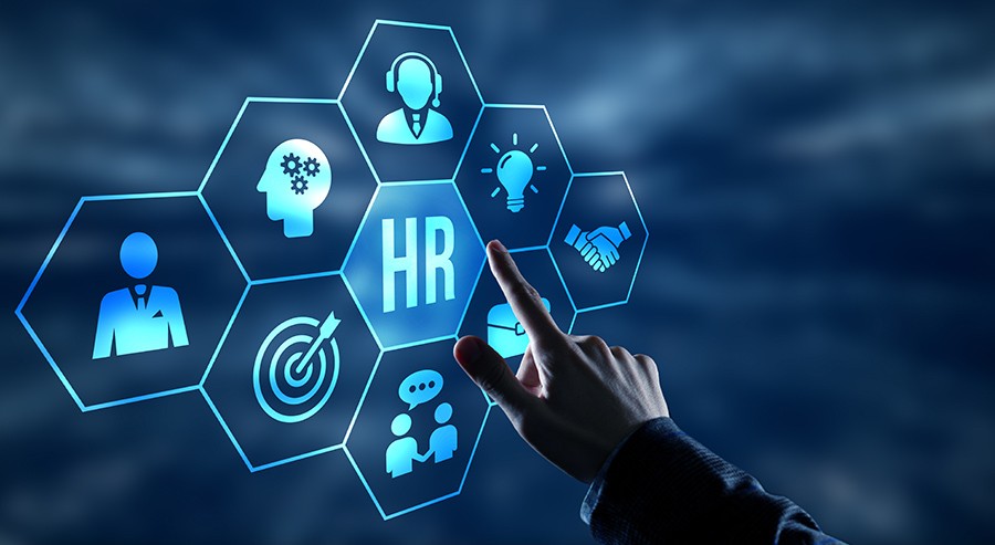 A hand interacting with a digital interface showing HR-related icons, representing the best HR software solutions in Pakistan for 2025.