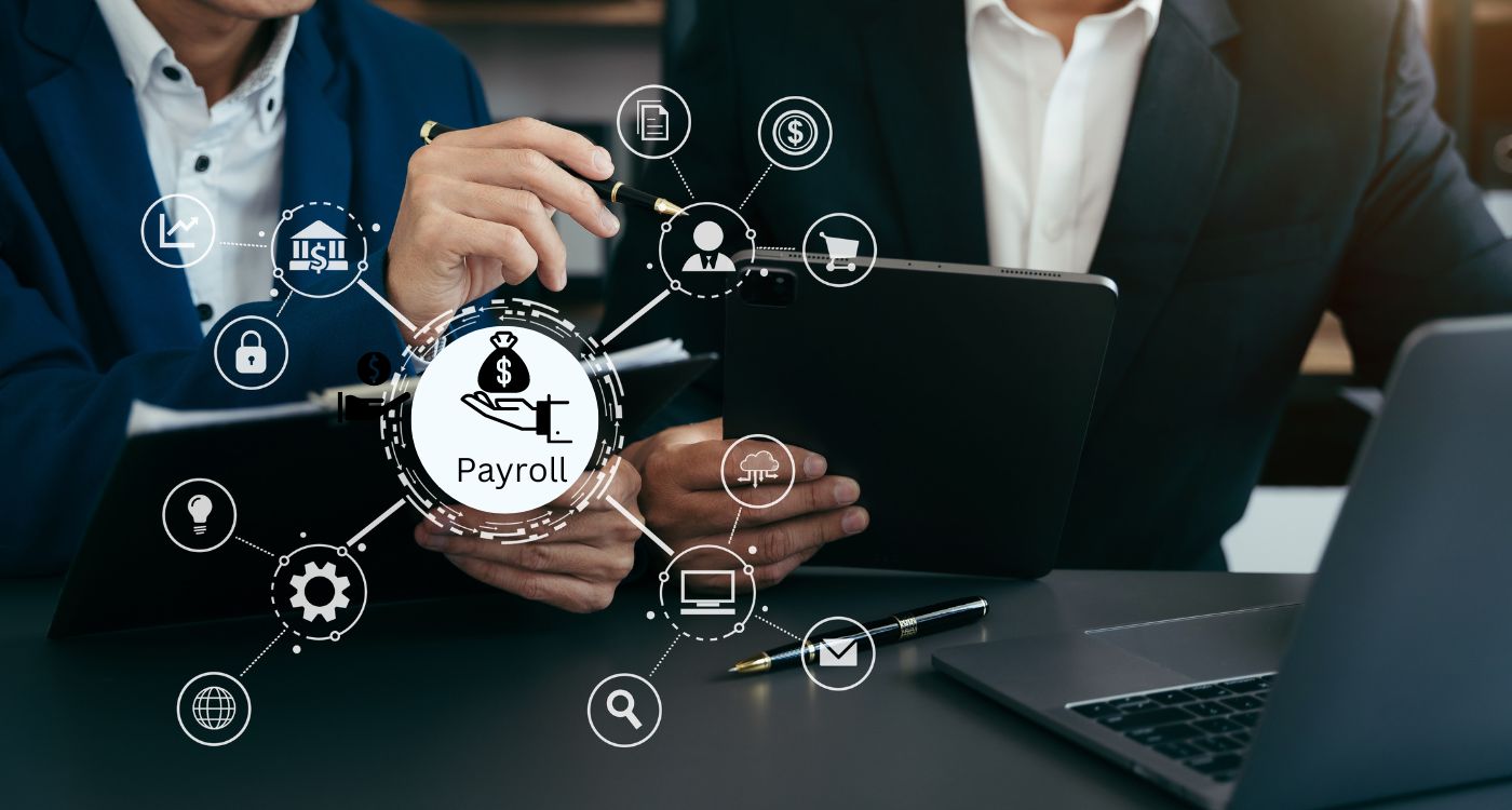 Business professionals using digital tools to manage payroll, showcasing the best payroll software in Pakistan with automation and HR features.