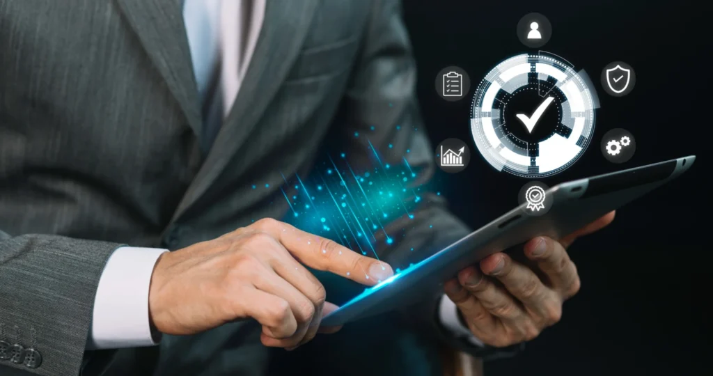 Business professional using a tablet with digital performance icons, representing an AI Performance Management System for smart employee reviews.