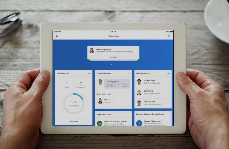 Tablet displaying onboarding interface using HR Dashboard Software in Pakistan with progress tracking and employee contact tools.