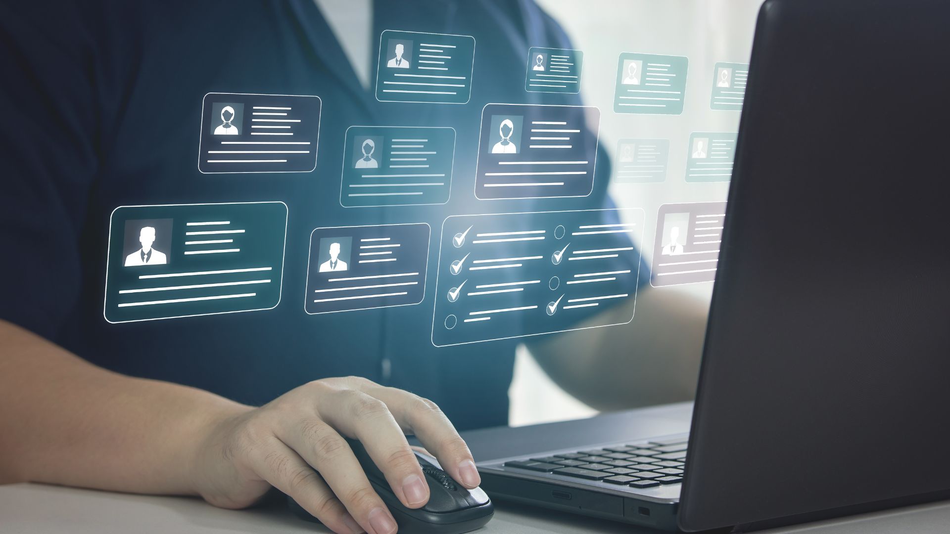 Person using HRM software on a laptop to manage digital employee profiles and tasks, representing the best HRM solution in Pakistan for growing businesses.