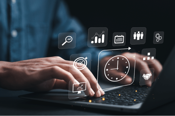 Person using a laptop with digital HR & Attendance Software icons, including clock, calendar, employee management, and analytics, symbolizing workforce automation.